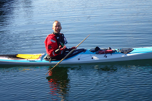 Gabriel in his kayak on a kayaking training