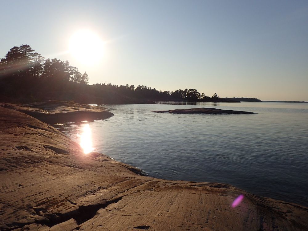 A beautiful sunrise by the rocks in the Finnish Archipelago
